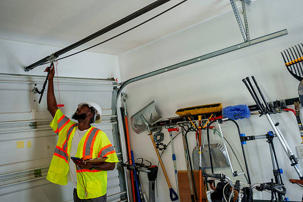Professional Garage Door Spring Repair technician working in Montclair State University, NJ